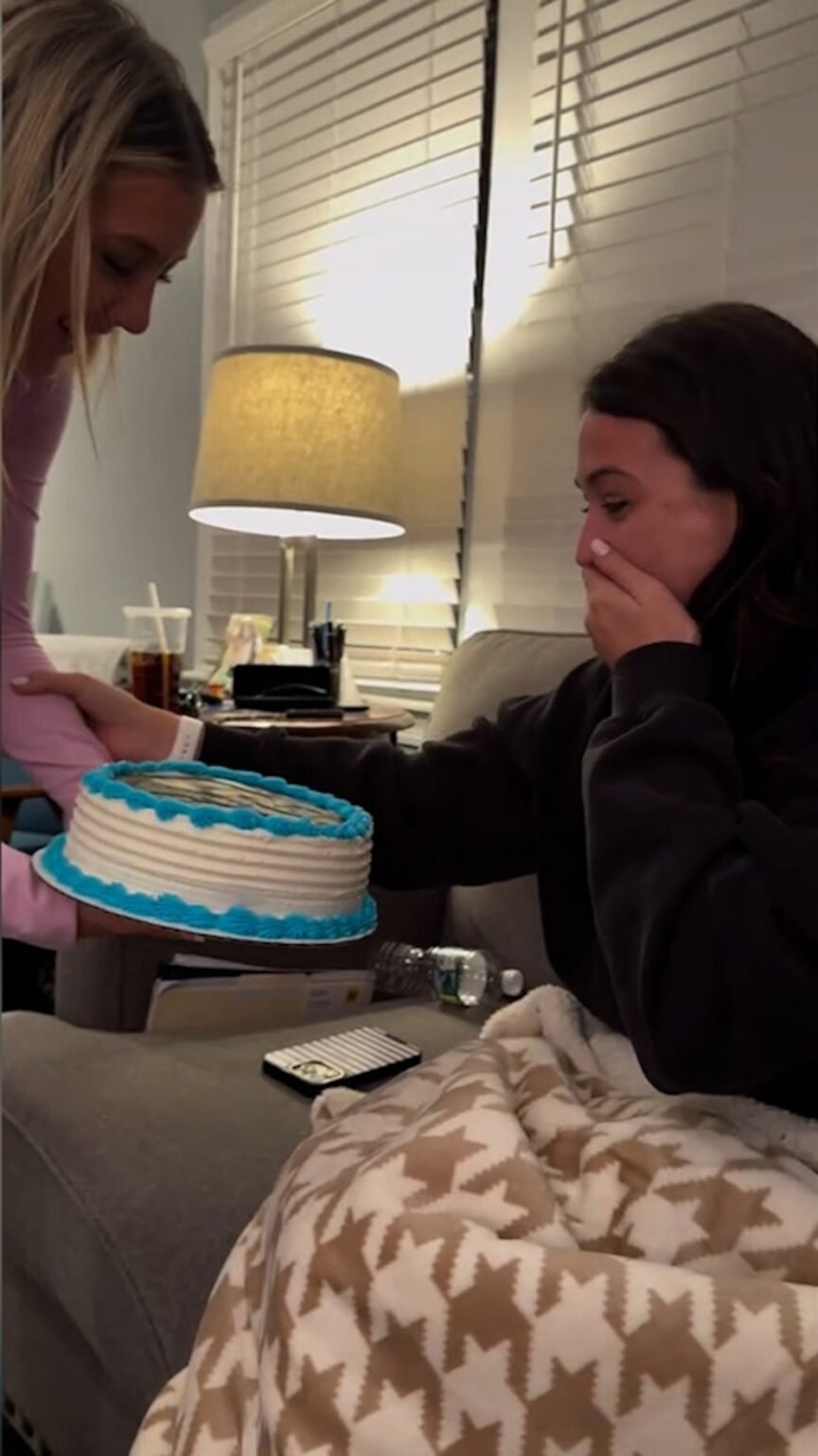 WATCH: Wife reacts after receiving cake decorated with favorite 'Fourth Wing' character