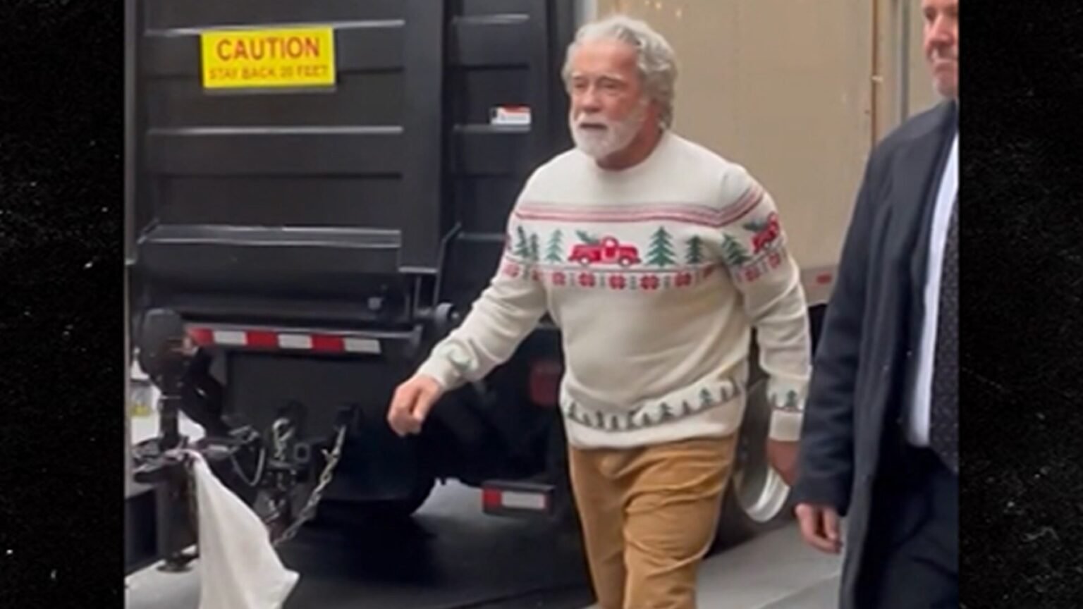 Arnold Schwarzenegger Transforms Into Santa on ‘The Man with the Bag’ Set