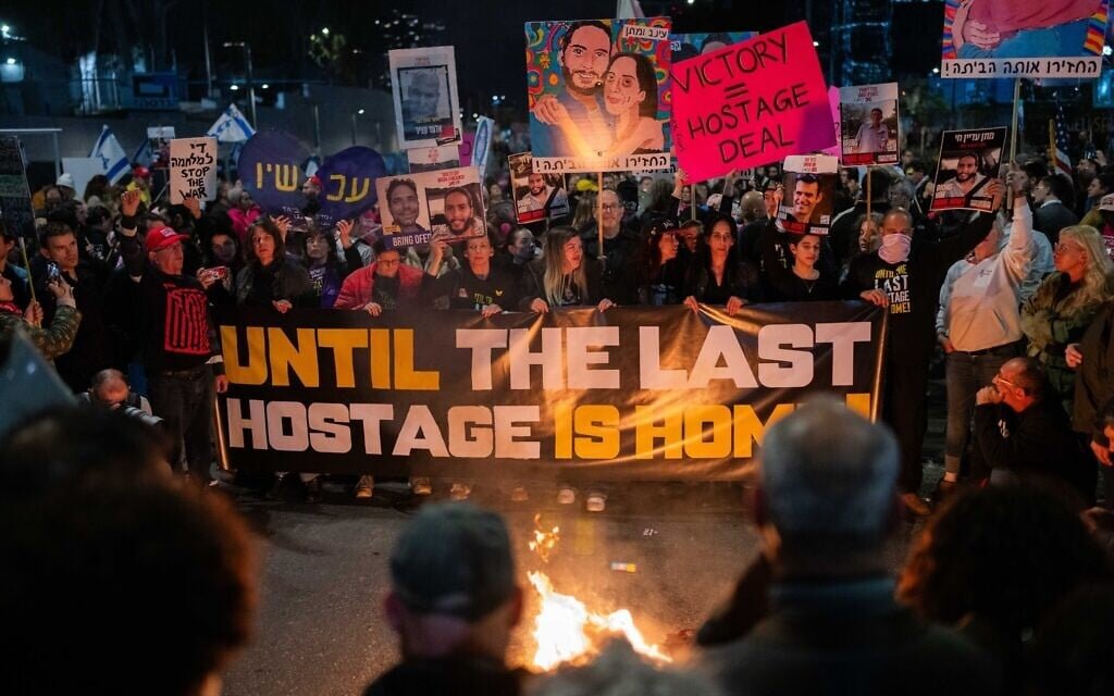 Rallies for, against hostage deal held across Israel hours before it takes effect
