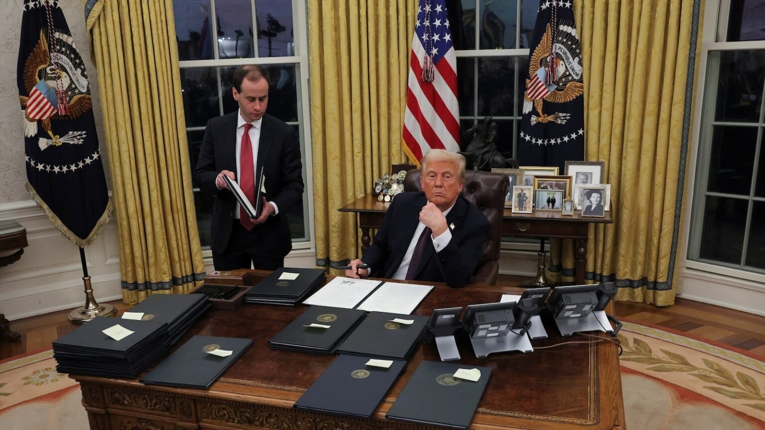 With the stroke of a pen, Trump tries to remake America: ANALYSIS